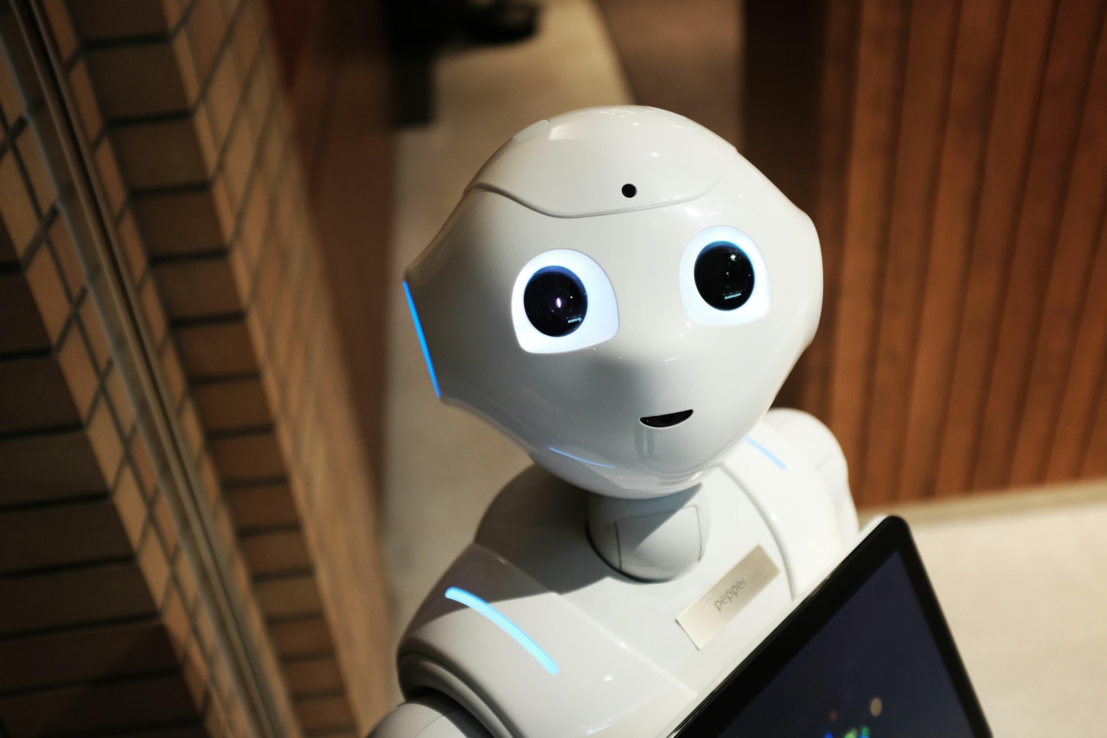 Futuristic technology interface showing upcoming AI tool launches with holographic displays and advanced computing systems